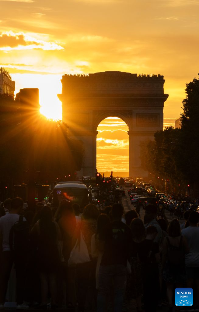 Photo taken on Aug. 3, 2026 shows a view of sunset in Champs-Elysees Avenue in Paris, France. (Xinhua/Wu Huiwo)