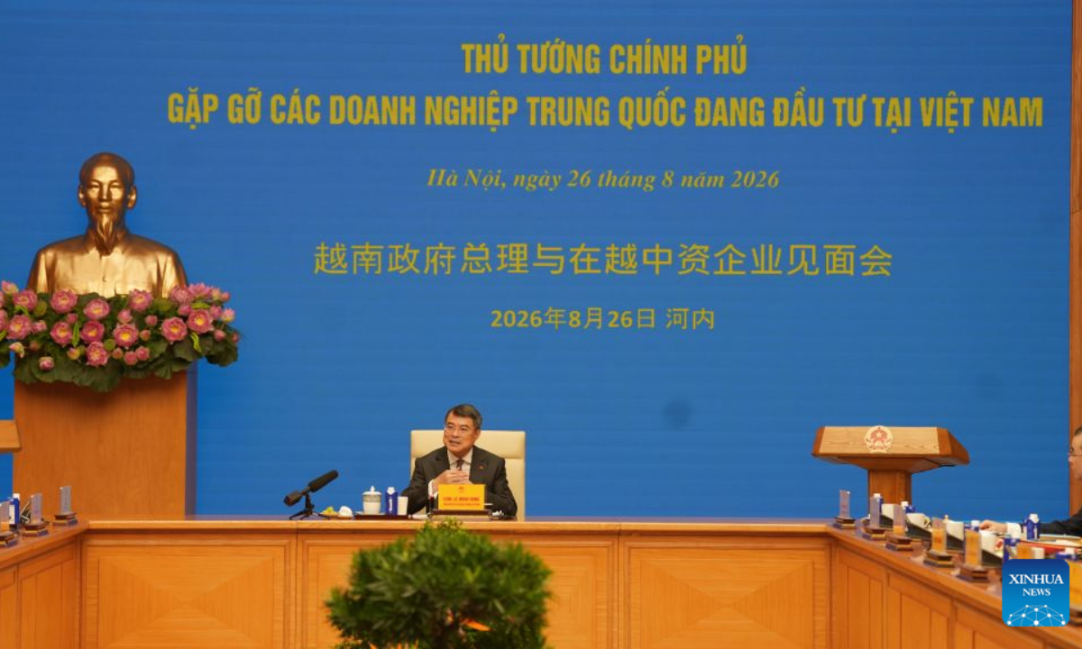 Vietnamese Prime Minister Le Minh Hung chairs a meeting with Chinese enterprises operating in Vietnam, in Hanoi, Vietnam, Aug. 26, 2026.
Vietnamese Prime Minister Le Minh Hung said Wednesday that the Vietnamese government will effectively safeguard the development rights and interests of Chinese enterprises and work to create a model of mutually beneficial and win-win cooperation. (Xinhua/Hu Jiali)