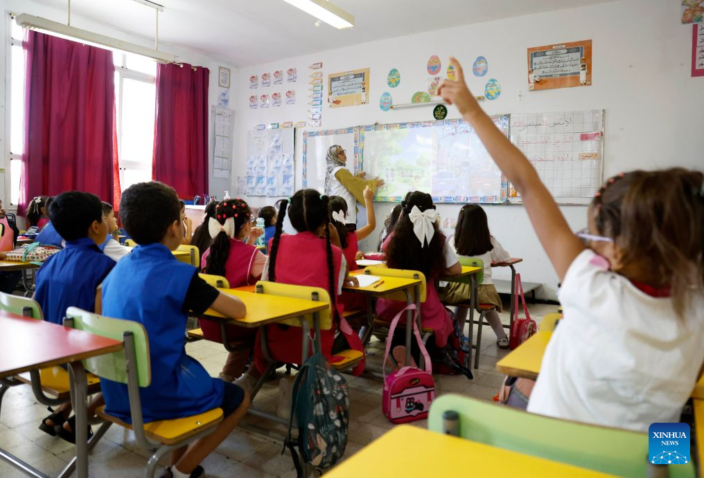 Students have a class at a school in Algiers, Algeria, on Sept. 21, 2026. Nearly 12 million students in primary and middle schools across Algeria returned to school on Monday. (Photo by Billel Bensalem/Xinhua)