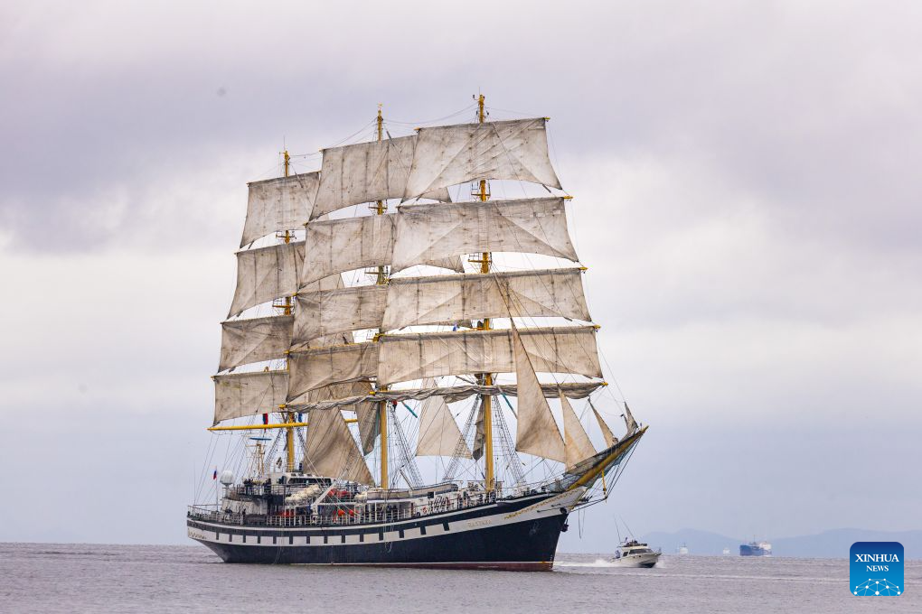 A sailboat is pictured during a parade of sails in Vladivostok, Russia, Sept. 1, 2026. A parade of sails was held during the 11th Eastern Economic Forum (EEF) on Tuesday, with more than 1,000 sailing enthusiasts participating. (Photo by Andrey Matveenko/Xinhua)