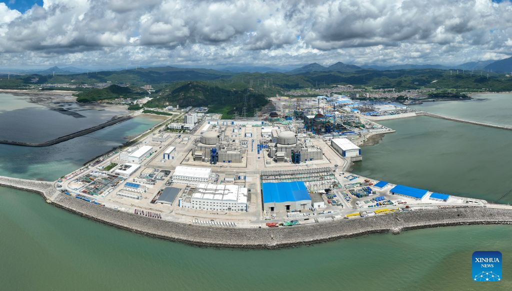 An aerial drone panorama photo taken on July 7, 2026 shows the construction site of the unit 3 of the Zhangzhou nuclear power project in Yunxiao County, southeast China's Fujian Province. The province of Fujian is rich in high-quality clean energy resources like wind power, solar energy, hydro power and nuclear power. In recent years, Fujian has relied on its local clean energy endowment and geographical advantages to build its smart new power grids and develop the region as a major clean energy hub in southeast China. It has accelerated the construction of power transmission channels, steadily upgraded urban and rural distribution networks, promoted the construction of smart micro-grids, continuously revitalized its clean energy advantages, and consolidated the foundation of energy security through the construction of smart new power grids. (Xinhua/Lin Shanchuan)