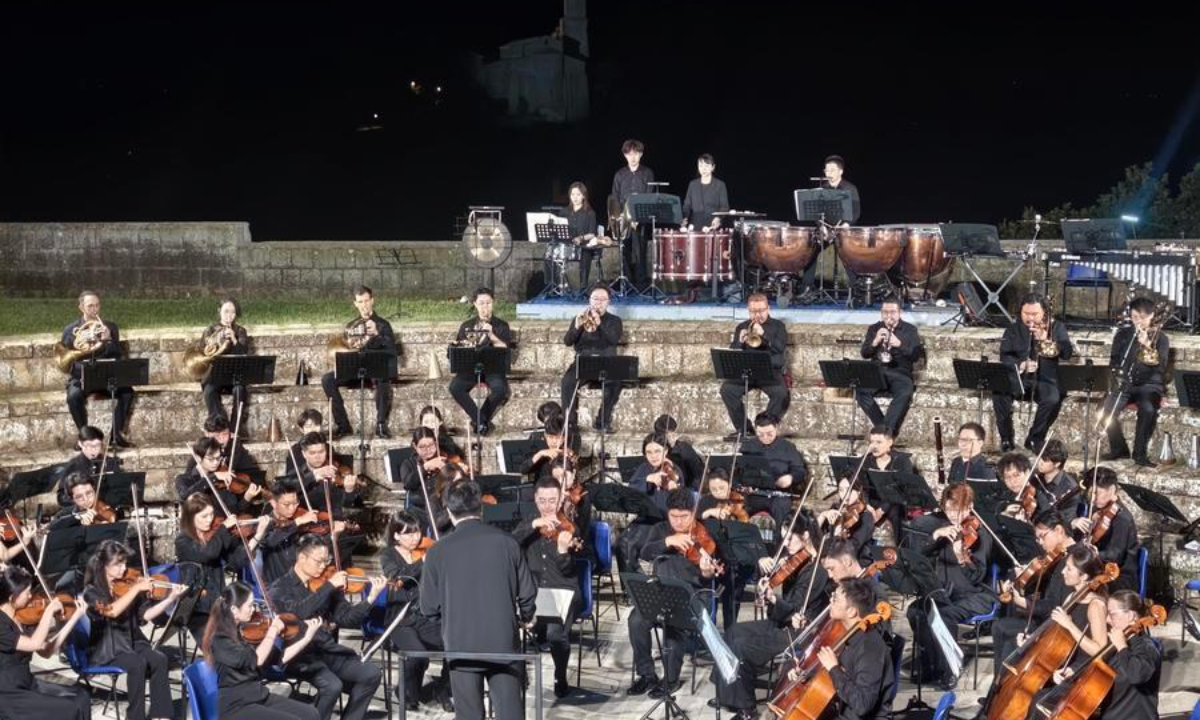 The Wuxi Symphony Orchestra of China performs during the Tuscania Summer Festival 2026 in Tuscania, Italy, on Aug. 25, 2026.  (Xinhua/Diao Ze)