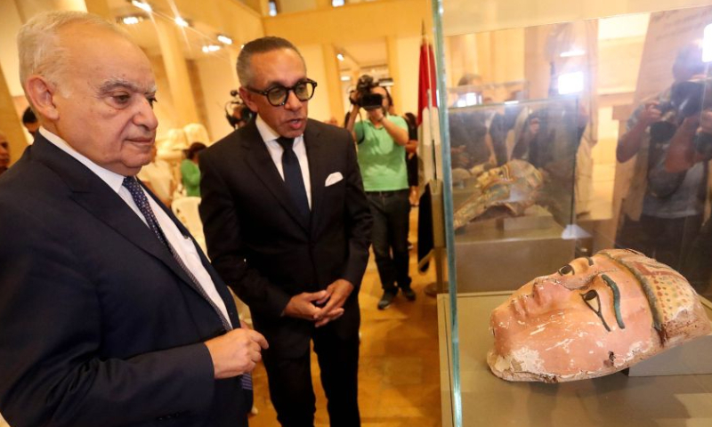 Lebanese Culture Minister Ghassan Salameh (1st L) hands over the ancient Egyptian artifacts to Egyptian Ambassador to Lebanon Alaa Moussa (2nd L) at a ceremony at the National Museum in Beirut, Lebanon, on Sept. 16, 2026. Lebanon on Wednesday returned to Egypt 37 ancient artifacts that had been illegally smuggled into Lebanon, according to a statement by Lebanon's Culture Ministry. (Xinhua/Bilal Jawich)
