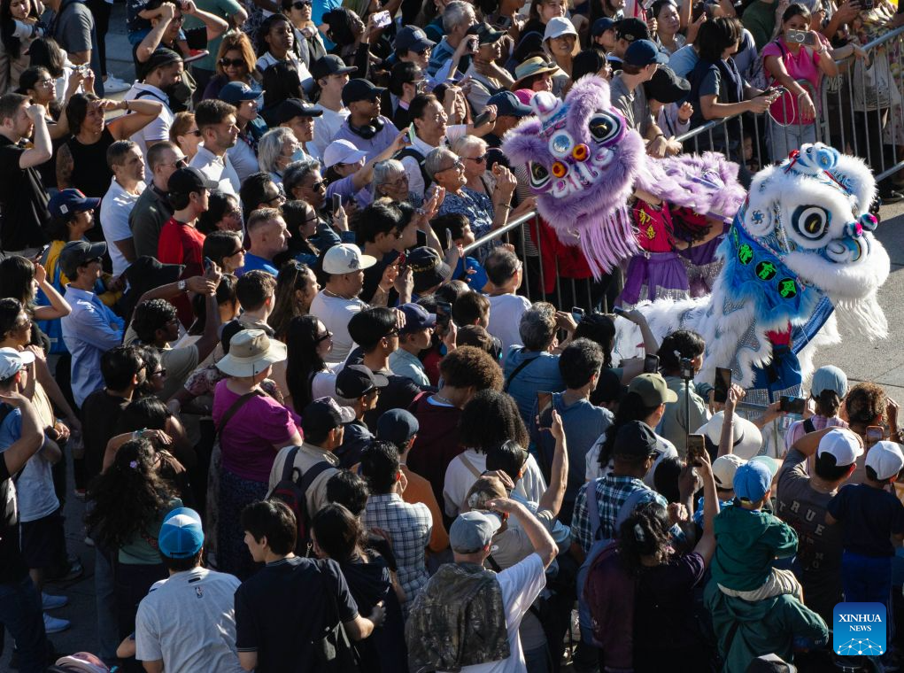 Lion dancers perform during the 2026 Toronto Dragon Festival at Nathan Phillips Square in Toronto, Canada, on Sept. 6, 2026. Hosted by the Canadian Association of Chinese Performing Arts (CACPA), this annual event was held here from Friday to Sunday to promote traditional Chinese culture through performing arts and related activities. (Photo by Zou Zheng/Xinhua)