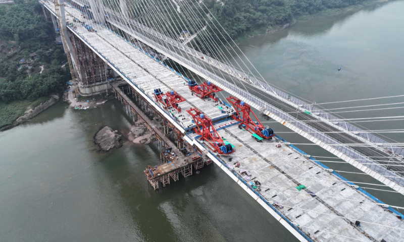 The Shituo Yangtze River Bridge, a key project on the Chongqing-Wanzhou high-speed railway, is under construction in Southwest China's Chongqing Municipality. Photo: Provided by Chongqing Municipality