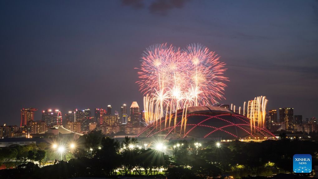 Fireworks light up the sky over Kallang Basin during the National Day celebrations in Singapore on Aug. 9, 2026.

Singapore celebrated the 61st anniversary of its independence on Sunday. (Xinhua/Then Chih Wey)