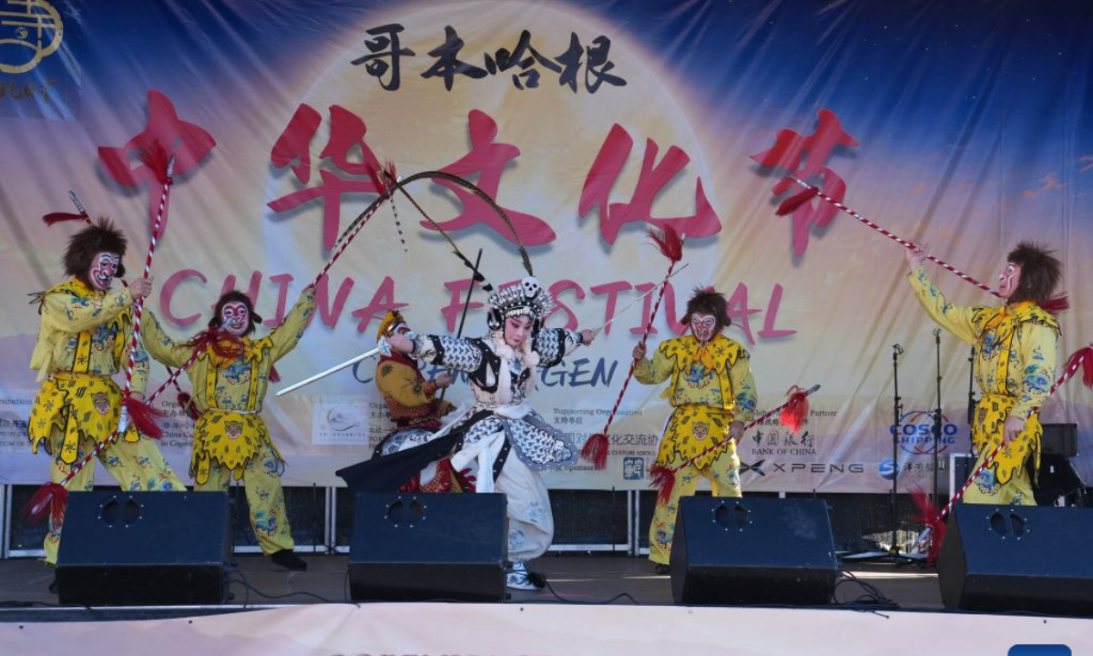 Performers perform Wu Opera during the first Copenhagen China Festival at Copenhagen City Hall Square in Copenhagen, Denmark, Sept. 27, 2026. Drums, lion dances, opera movements and the aroma of Chinese food filled Copenhagen's City Hall Square on Sunday as the first Copenhagen China Festival was held in celebration of the Mid-Autumn Festival.(Photo by Liu Zhichao/Xinhua)