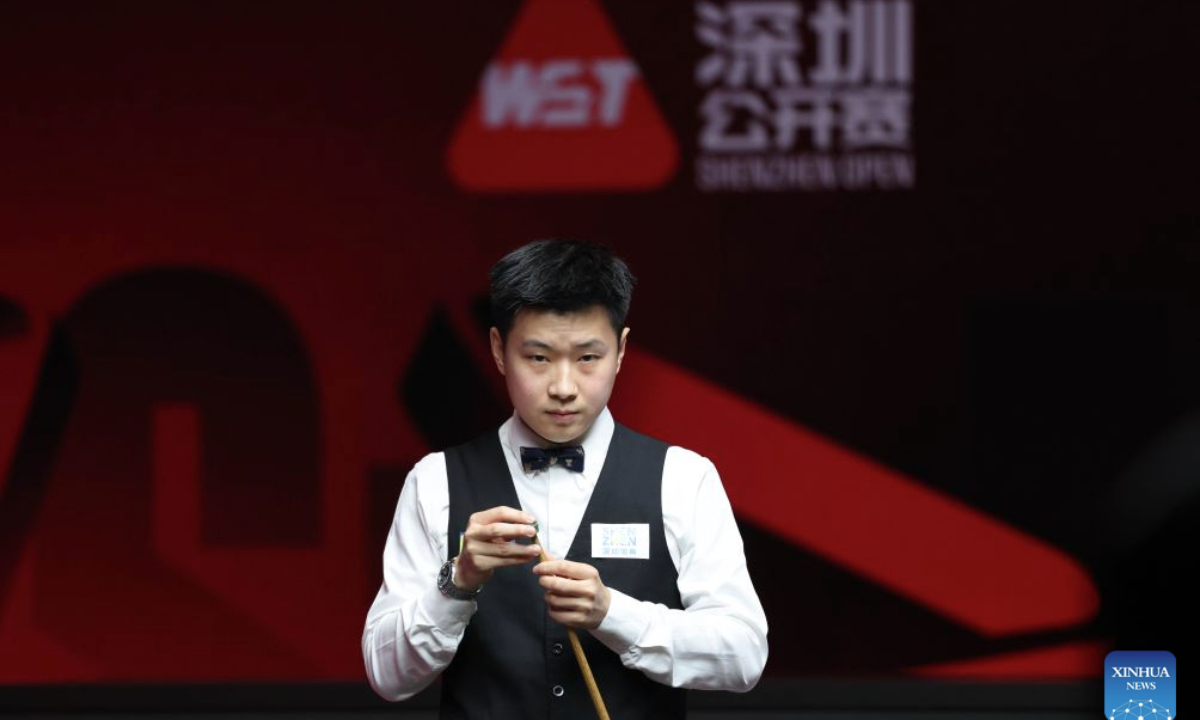 Zhao Xintong reacts during the round 2 match between Scott Donaldson of Scotland and Zhao Xintong of China at World Snooker Tour Shenzhen Open 2026 in Shenzhen, south China's Guangdong Province, Sept. 28, 2026. (Xinhua/Liang Xu)