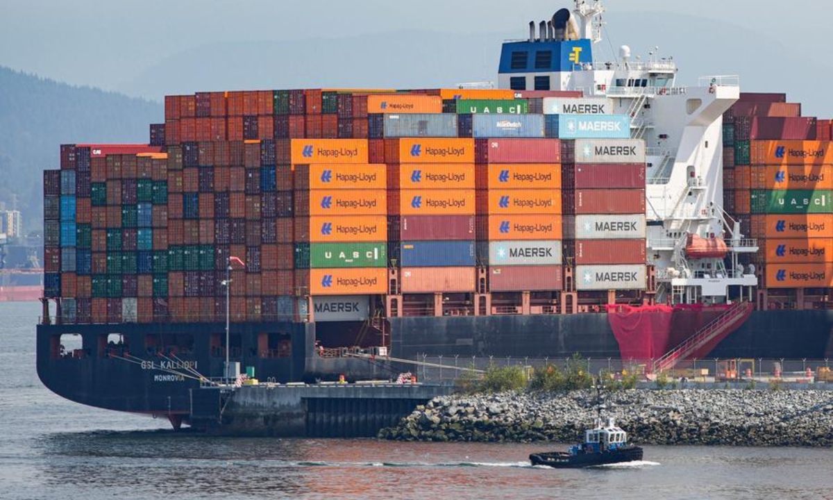 A container ship is seen docked at the port in Vancouver, British Columbia, Canada, Aug. 25, 2026. (Photo by Liang Sen/Xinhua)
