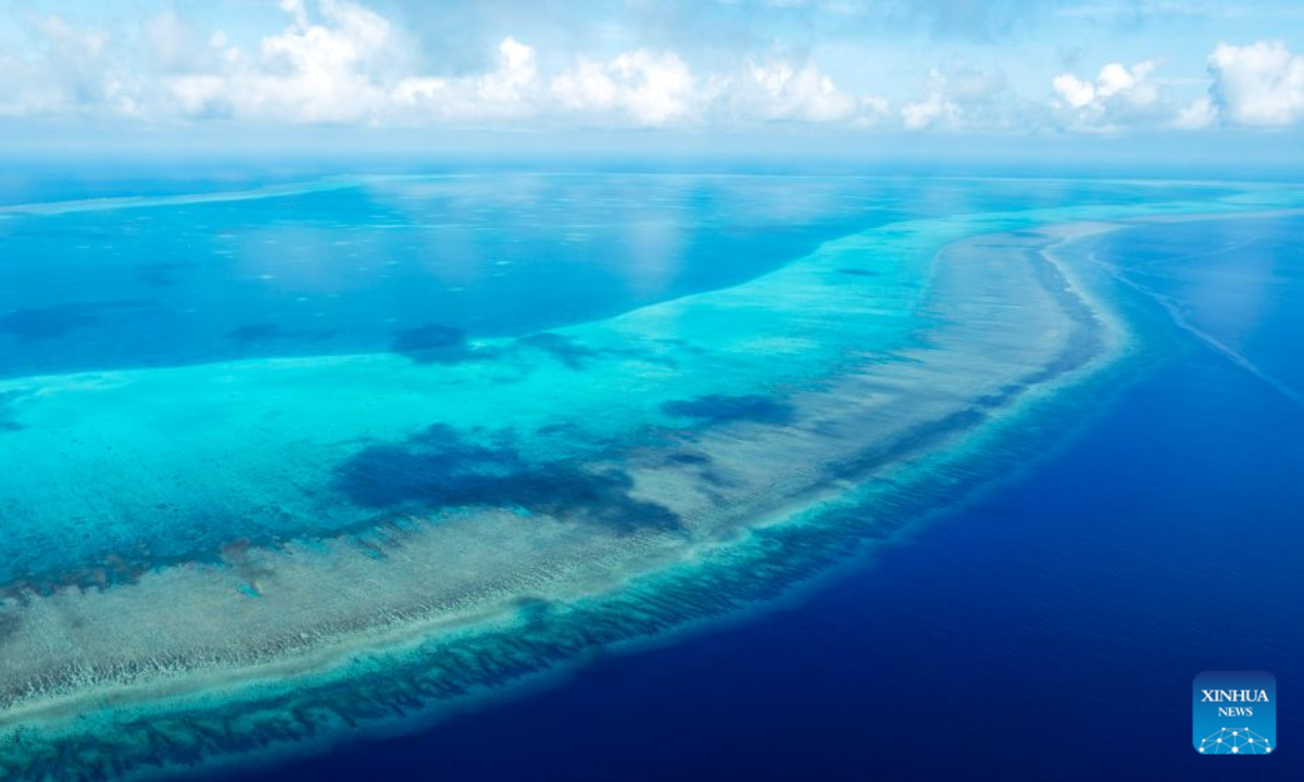 An aerial drone photo taken on July 8, 2026 shows the coral reef flat and shoals in the territorial waters of China's Huangyan Dao in the South China Sea. Huangyan Dao, located in China's Zhongsha Qundao, features a unique coral reef ecosystem and special geological structures. It is home to numerous rare and endangered species, making it an area of high biodiversity and species rarity.
Huangyan Dao is China's inherent territory. In September 2025, China formally approved to establish the Huangyan Dao National Nature Reserve.
The China Coast Guard has carried out regular patrols and law enforcement to safeguard China's territorial sovereignty, maritime rights and interests, and ecological environment in the waters of the reserve. (Xinhua/Wang Peng)