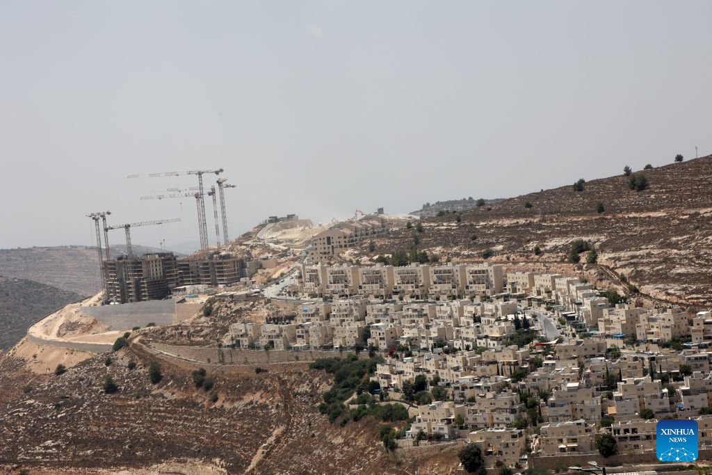 This photo taken on Aug. 9, 2026 shows an Israeli settlement under construction in the West Bank, near Jerusalem. In recent years, Israel's continued approval of settlement expansions in the region has drawn widespread criticism from the international community. (Photo by Gil Cohen Magen/Xinhua)