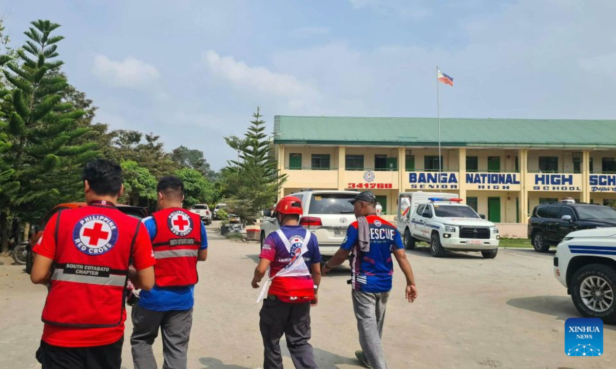 Volunteers from the Philippine Red Cross are pictured at the site of a school shooting at a high school in the municipality of Banga, South Cotabato Province, the Philippines, Sept. 18, 2026. At least six people were killed and 17 others injured in a school shooting in southern Philippines on Friday, according to the Department of Social Welfare and Development (DSWD). (Philippine Red Cross/Handout via Xinhua)