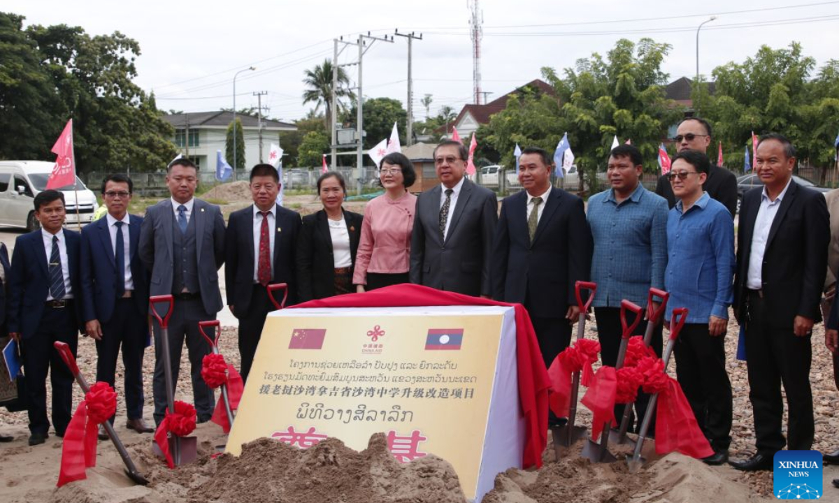 Representatives from China and Laos attend the groundbreaking ceremony for the China-aided upgrading and renovation project of Savannakhet Secondary School in Savannakhet province, Laos, Aug. 14, 2026. (Photo by Wang Yuping/Xinhua)