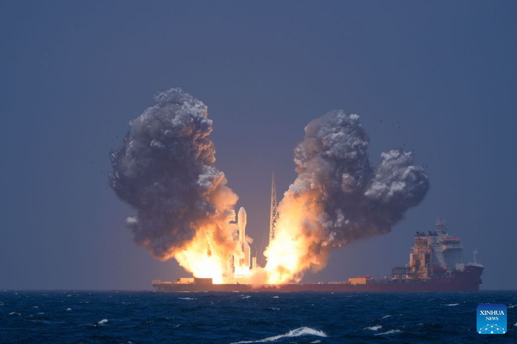 A Gravity-1 carrier rocket carrying nine satellites blasts off from waters off the coast of Shanghai, east China, July 22, 2026. The Taiyuan Satellite Launch Center launched the commercial rocket at 10:54 a.m. (Beijing Time), placing nine satellites into their designated orbits. (Xinhua)