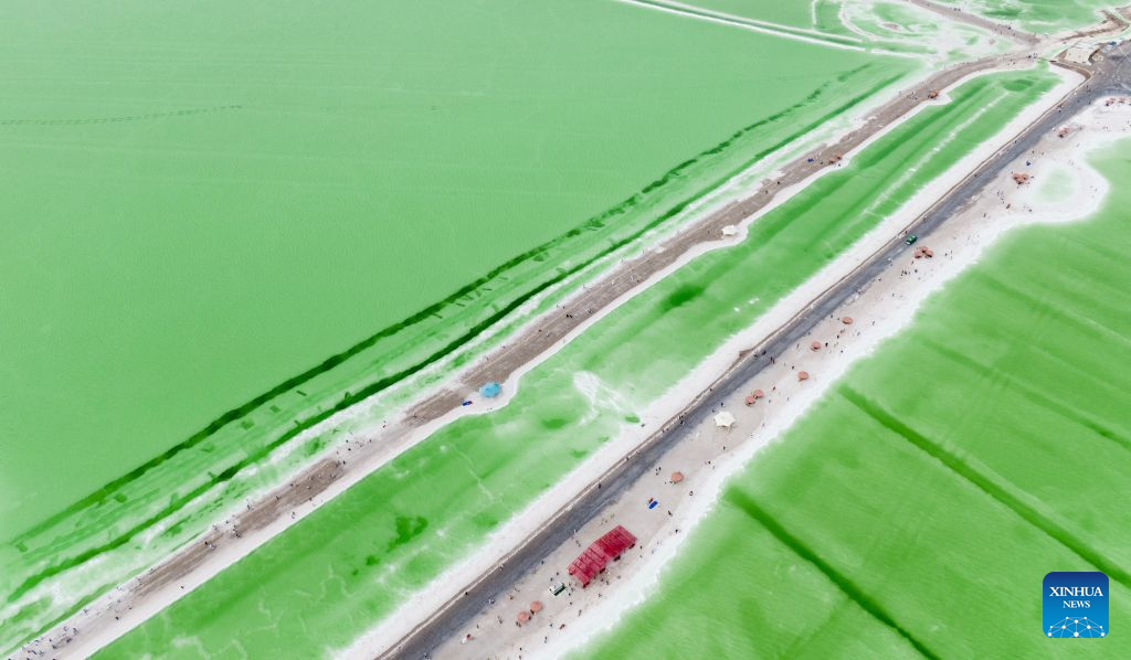 An aerial drone photo taken on July 9, 2026 shows the scenery of the Qairhan salt lake in Golmud, northwest China's Qinghai Province. The Qairhan salt lake, with a total area of 5,856 square kilometers, has been the largest potash fertilizer producing base in China. (Xinhua/Wang Yan)