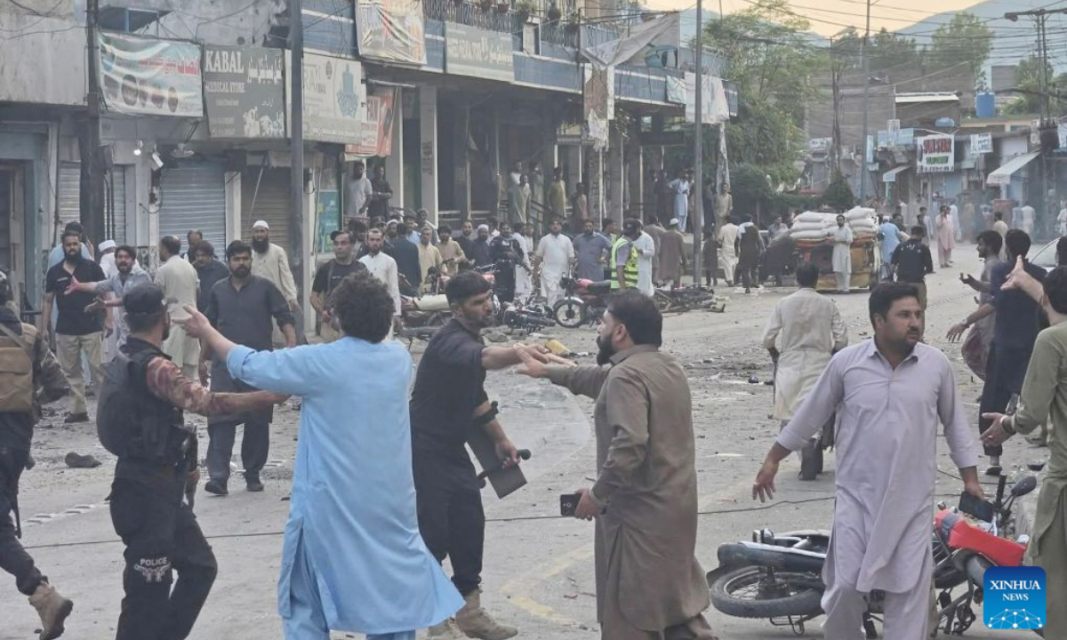 Photo taken with a mobile phone on Aug. 2, 2026 shows the blast site in Khyber Pakhtunkhwa province, Pakistan. The death toll from a suicide blast near a peace rally in Pakistan's northwestern Khyber Pakhtunkhwa province has risen to 14, while 26 others were injured, police sources told Xinhua on Sunday. (Str/Xinhua)