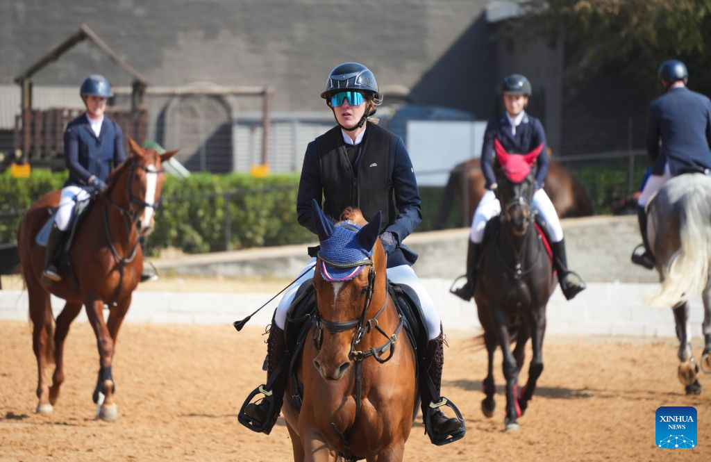 Riders train before the Toyota SA Showjumping Champs 2026 in Johannesburg, South Africa, Aug. 9, 2026. The event was held from Aug. 5 to 9 at Kyalami Park Club in Johannesburg. (Xinhua/Chen Wei)