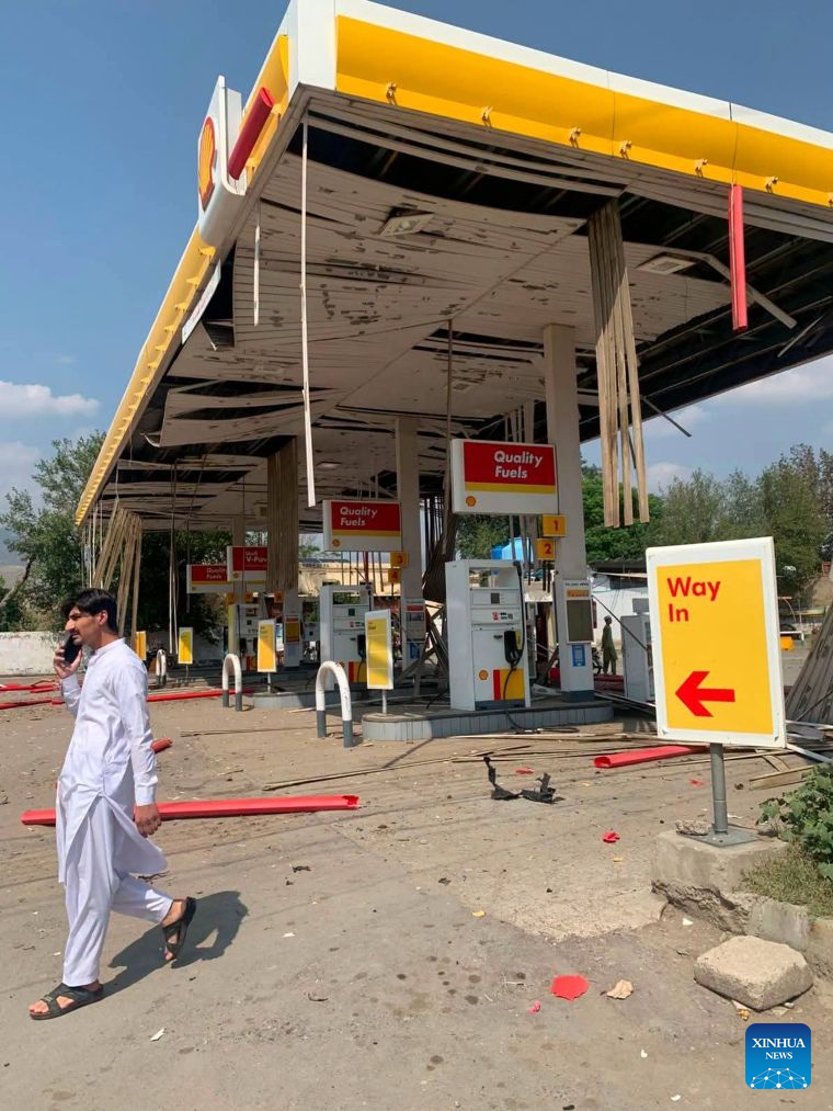 This photo taken with mobile phone shows a blast site at Kohat in Pakistan's Khyber Pakhtunkhwa province on Sept. 18, 2026. At least 16 people were killed and over 50 others injured in a twin suicide attack inside a residential compound of police in Pakistan's Khyber Pakhtunkhwa province on Friday, police and rescue officials said. (Str/Xinhua)