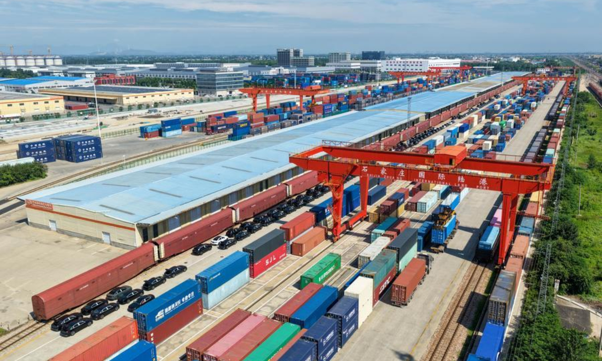 An aerial drone photo taken on Aug. 4, 2026 shows a container loading site of the Shijiazhuang international land port in north China's Hebei Province. (Photo by Liang Zidong/Xinhua)