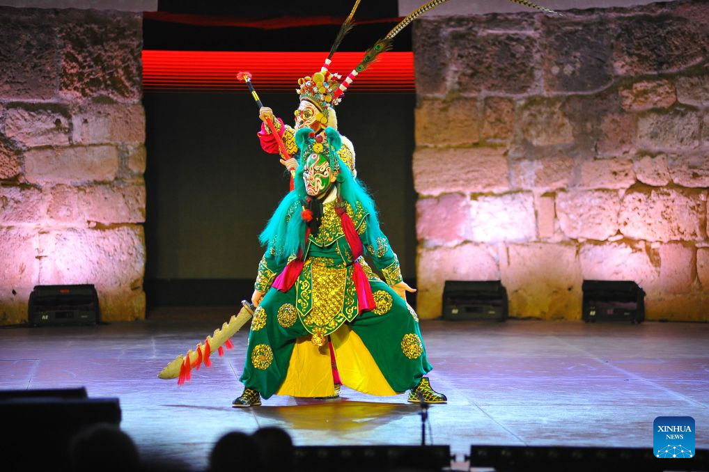 Artists of the China National Peking Opera Company perform at the ancient theatre of Carthage in Tunis, Tunisia, Aug. 11, 2026. The China National Peking Opera Company presented a performance on Tuesday at the Folklores of the World event during the 60th Carthage Festival in Tunis. (Photo by Adel Ezzine/Xinhua)