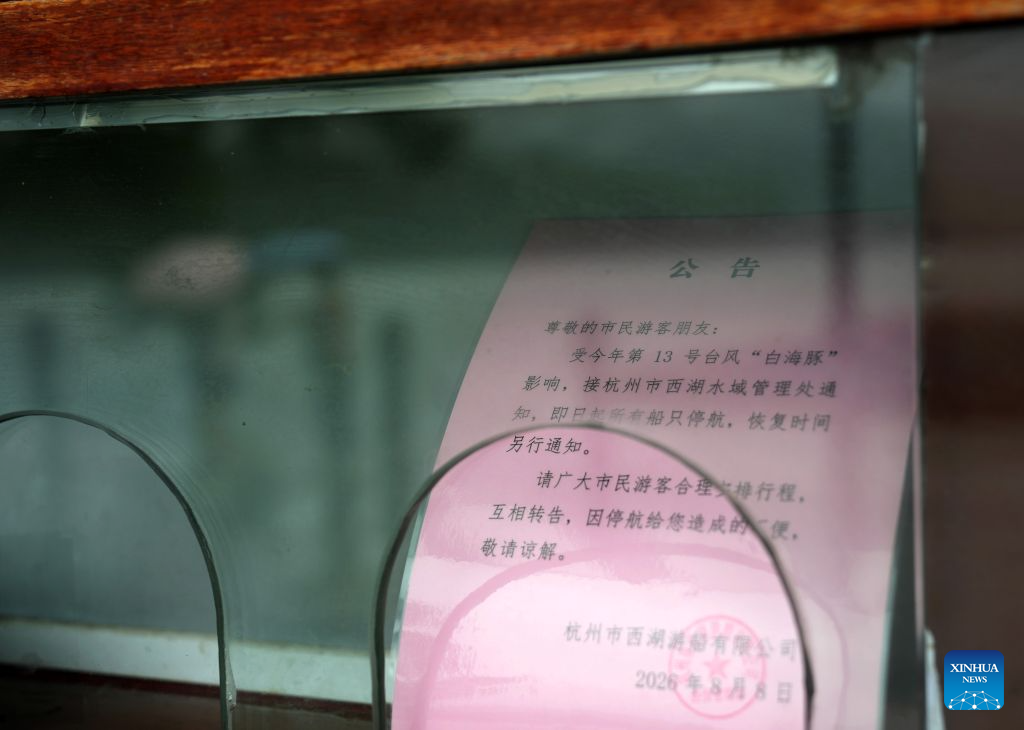 A notice on the suspension of sightseeing boats is seen at the West Lake scenic spot in Hangzhou, east China's Zhejiang Province, Aug. 9, 2026. China's national observatory on Sunday activated a red alert -- the highest level in the country's typhoon warning system -- as Typhoon Dolphin approaches.

Typhoon Dolphin is forecast to make landfall along the country's east coast from Zhoushan in Zhejiang Province to Fuding in Fujian Province, according to the National Meteorological Center (NMC). (Xinhua/Han Chuanhao)
