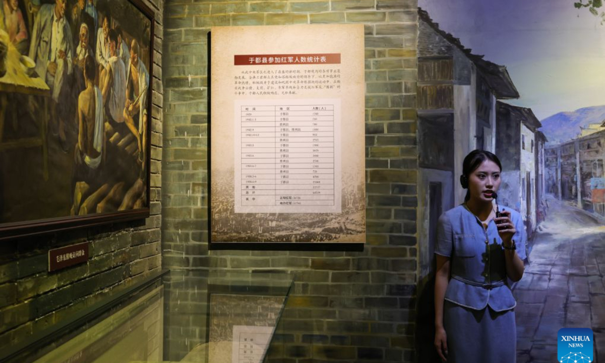 A staff member introduces the story of the Yudu people and the Red Army at the memorial museum of the Central Red Army's departure for the Long March in Yudu County, east China's Jiangxi Province, Sept. 2, 2026. (Xinhua/Wang Jingqiang)