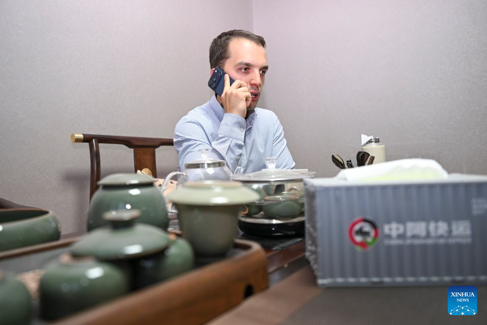 Arseniy Kretov works at an office in Urumqi, northwest China's Xinjiang Uygur Autonomous Region, Sept. 2, 2026. (Xinhua/Hu Huhu)