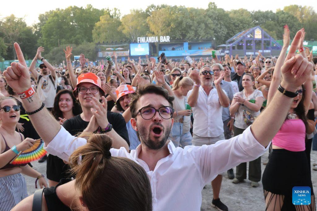 People enjoy performances during the 2026 Sziget Festival in Budapest, Hungary, Aug. 10, 2026. The event officially opened to the public on Tuesday on Budapest's Obuda Island, bringing together music, arts and cultural programs from Hungary and abroad.

Running until Aug. 15, this year's festival provided around 12 themed districts offering music, contemporary arts, circus performances, sports, family and community programs. (Photo by Attila Volgyi/Xinhua)