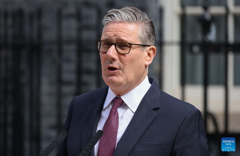 British Prime Minister Keir Starmer delivers a speech outside No. 10 Downing Street in London, Britain, on June 22, 2026. Starmer announced in a speech outside No. 10 Downing Street on Monday that he would resign as leader of the governing Labour Party and set out a timetable for his departure from office. Starmer said he would remain in office as prime minister until the Labour leadership contest is completed and would do everything I can to ensure an orderly handover of power. (Xinhua)