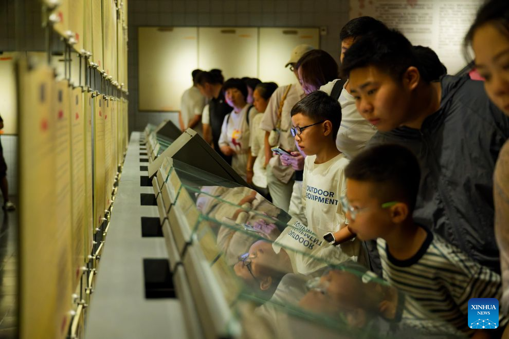 People visit the Exhibition Hall of Evidences of Crime Committed by Unit 731 of the Japanese Imperial Army in Pingfang District of Harbin, northeast China's Heilongjiang Province, Aug. 4, 2026. During the summer vacation, the Exhibition Hall of Evidences of Crime Committed by Unit 731 of the Japanese Imperial Army has greeted lots of visitors.
People tour the exhibition hall to view archival evidence exposing the germ warfare crimes perpetrated by notorious Japanese Unit 731 during World War II.
Unit 731 was a top-secret biological and chemical warfare research base established as the nerve center for Japanese biological warfare in China and Southeast Asia during WWII. At least 3,000 people were used in human experiments conducted by Unit 731, and more than 300,000 people in China were killed by Japan's biological weapons. (Xinhua/Zhang Tao)