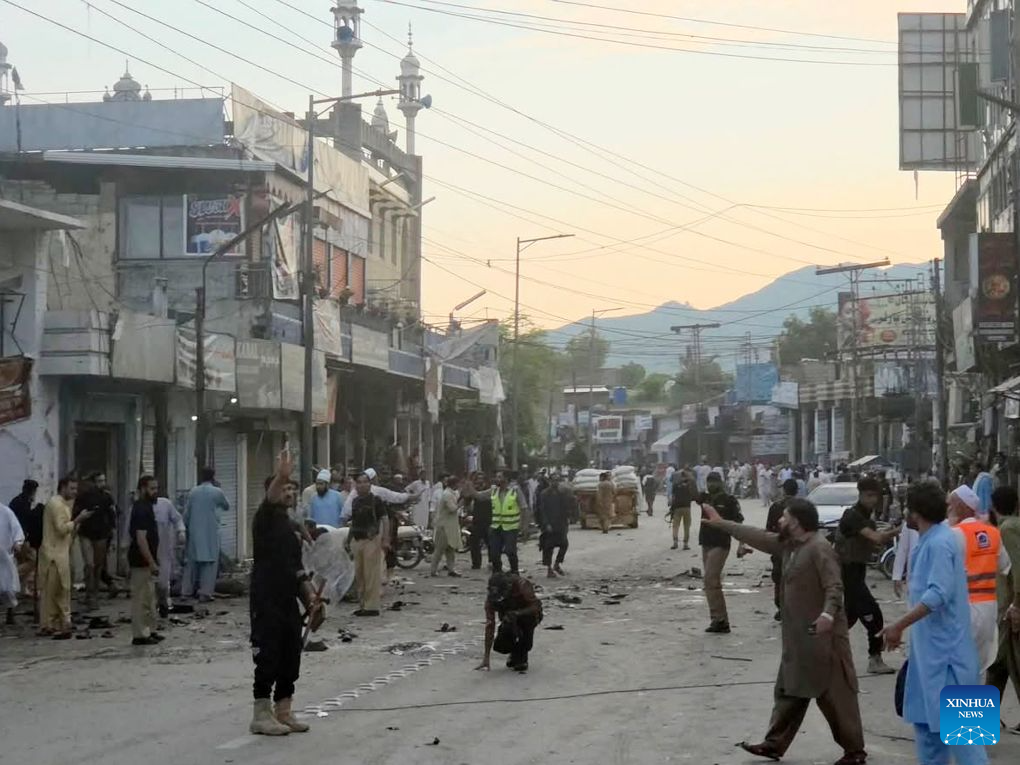 Photo taken with a mobile phone on Aug. 2, 2026 shows the blast site in Khyber Pakhtunkhwa province, Pakistan. The death toll from a suicide blast near a peace rally in Pakistan's northwestern Khyber Pakhtunkhwa province has risen to 14, while 26 others were injured, police sources told Xinhua on Sunday. (Str/Xinhua)