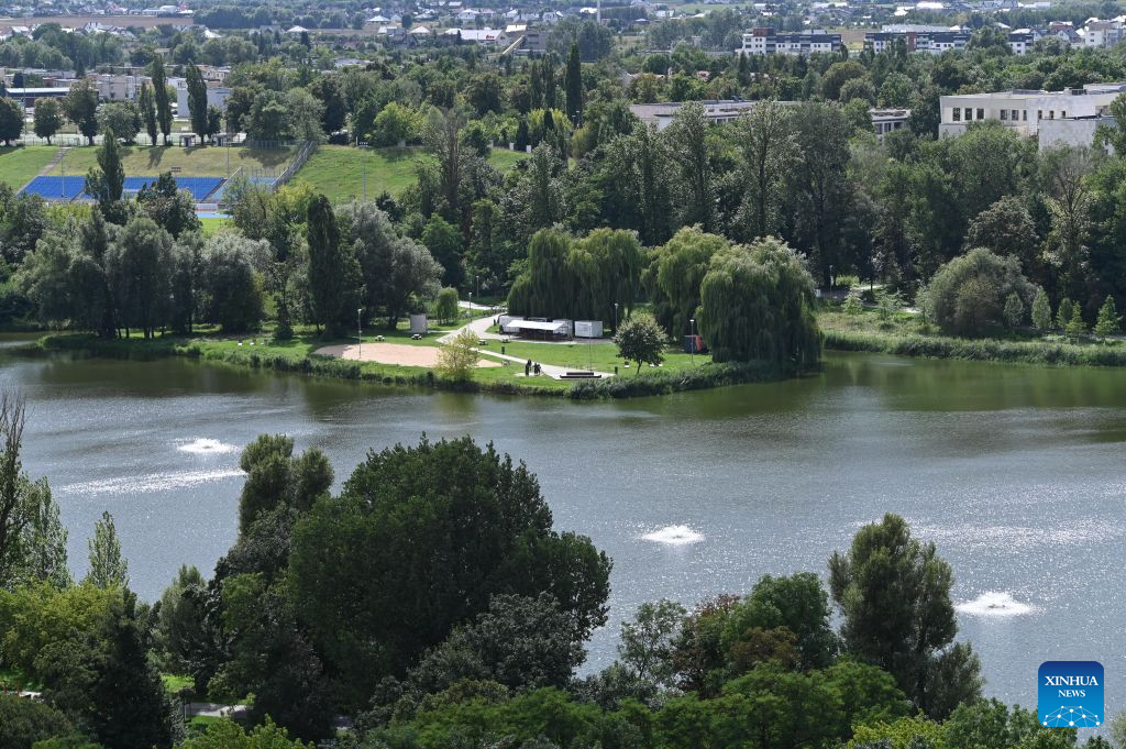 This photo taken on Aug. 11, 2026 shows a lake in Gniezno, Poland. Gniezno is one of Poland's oldest cities and is known for its rich history and cultural heritage. (Photo by Aleksy Witwicki/Xinhua)