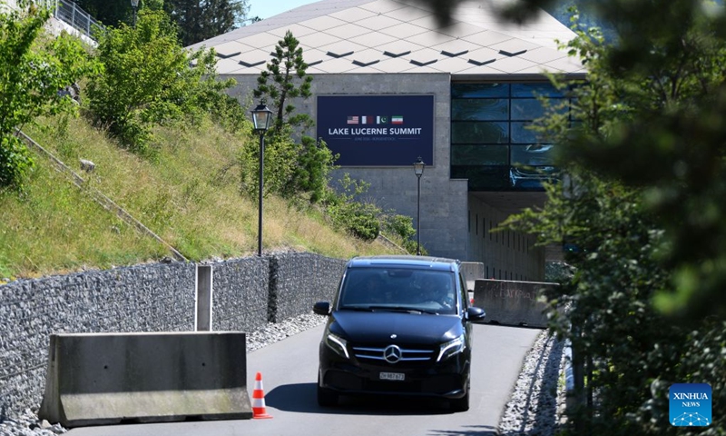 A building with a sign of talks between Iran, the United States and the mediators is pictured in Buergenstock near Lucerne, Switzerland, June 22, 2026. Switzerland said on Monday that it welcomes the constructive progress made during talks between Iran, the United States and the mediators that continued throughout Sunday night at the Buergenstock resort in Switzerland. (Photo: Xinhua)