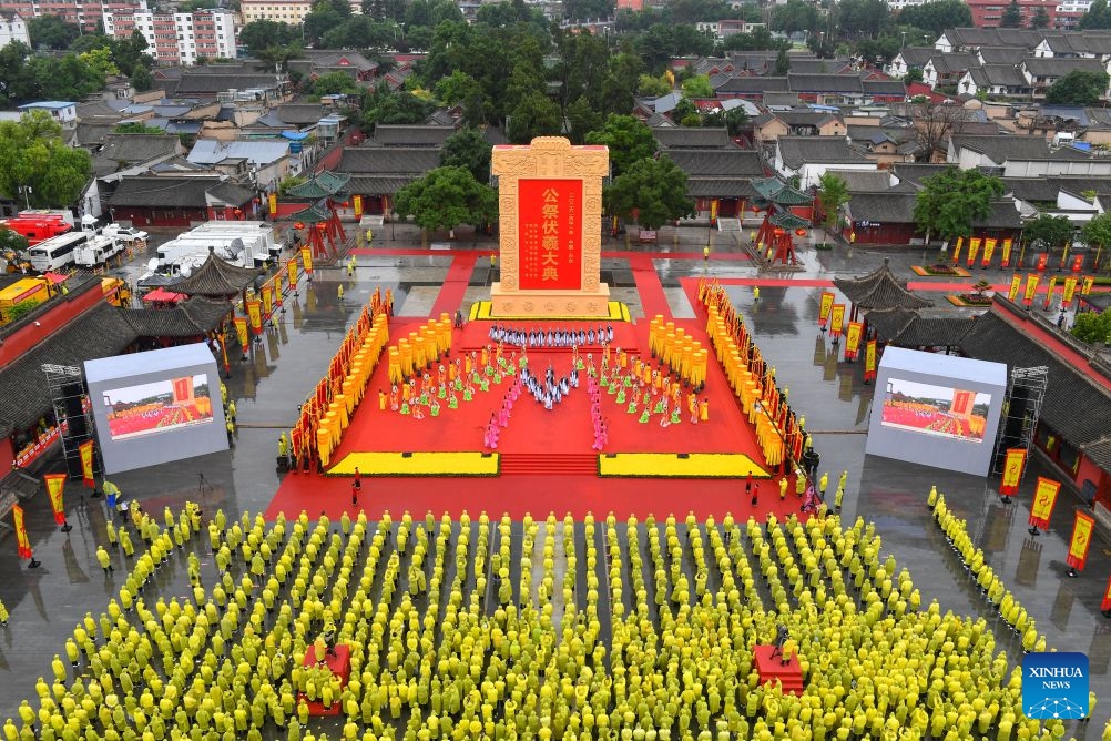 A drone photo taken on June 21, 2026 shows a ceremony worshiping Fuxi, a mythical ancestor of the Chinese nation, in Tianshui, northwest China's Gansu Province. Tianshui is known as the birthplace of the mythical figure, who is worshiped for his contribution to teaching people about fishing, hunting and animal husbandry. According to historical records, the annual commemoration of Fuxi has a history of more than 2,000 years. It was listed as a form of national intangible cultural heritage in 2006. (Photo: Xinhua)