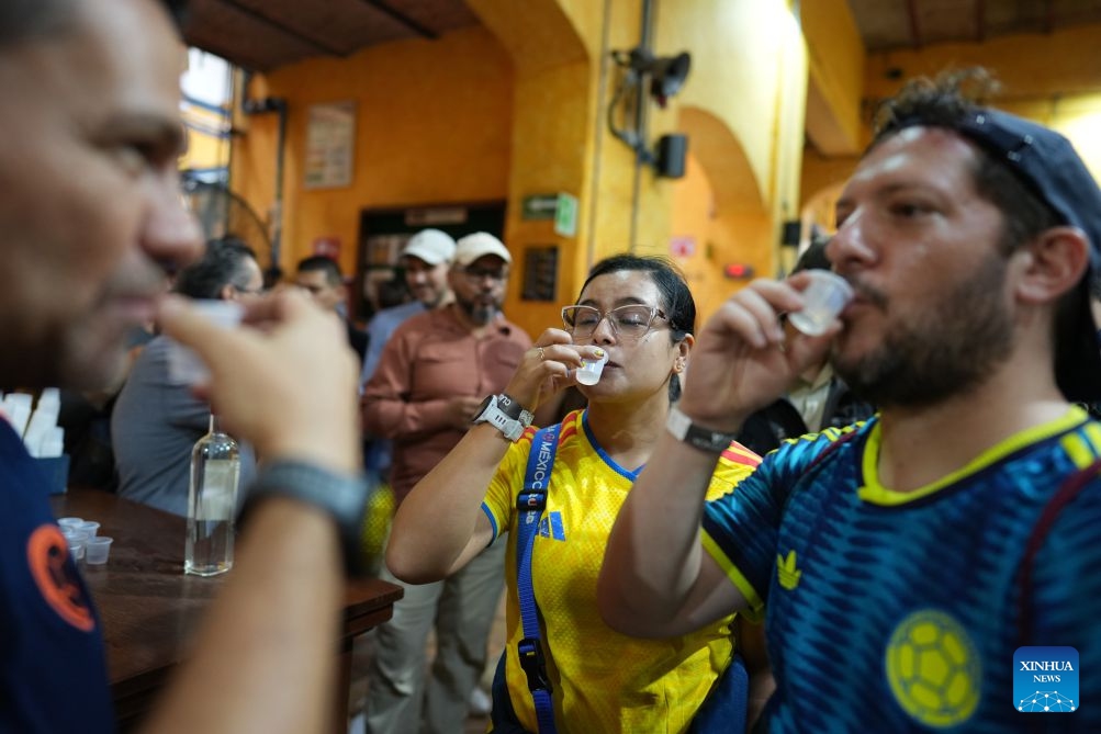 Visitors taste tequila at Jose Cuervo distillery in Tequila, Jalisco State, Mexico, June 21, 2026. Tequila is Mexico's most iconic national spirit, distilled from the blue agave plant, the vast majority of which is grown in the state of Jalisco. (Photo: Xinhua)