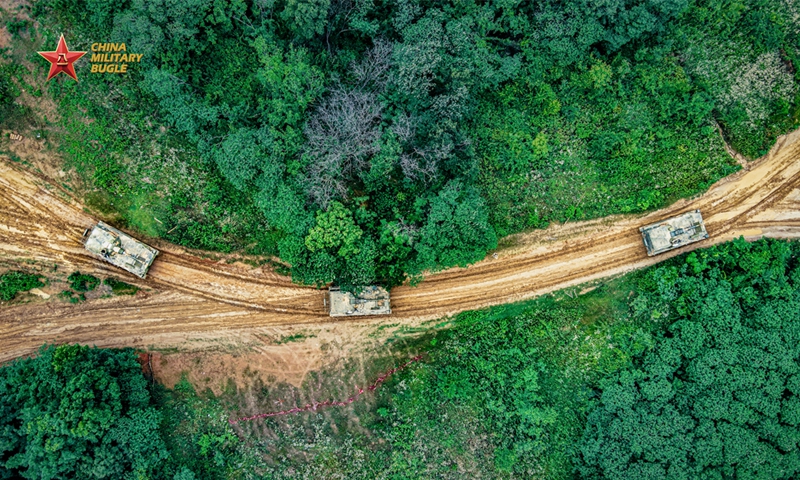 PLZ-89 122mm self-propelled howitzers attached to an artillery unit of a brigade under the Chinese PLA Army head towards the designated area during a live-fire training exercise in early June, 2026. (Photo: eng.chinamil.com.cn)
