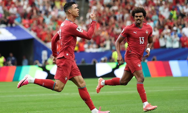 Cristiano Ronaldo (L) of Portugal celebrates scoring during the Group K match against Uzbekistan at the 2026 FIFA World Cup at Houston Stadium, June 23, 2026. (Photo: Xinhua)