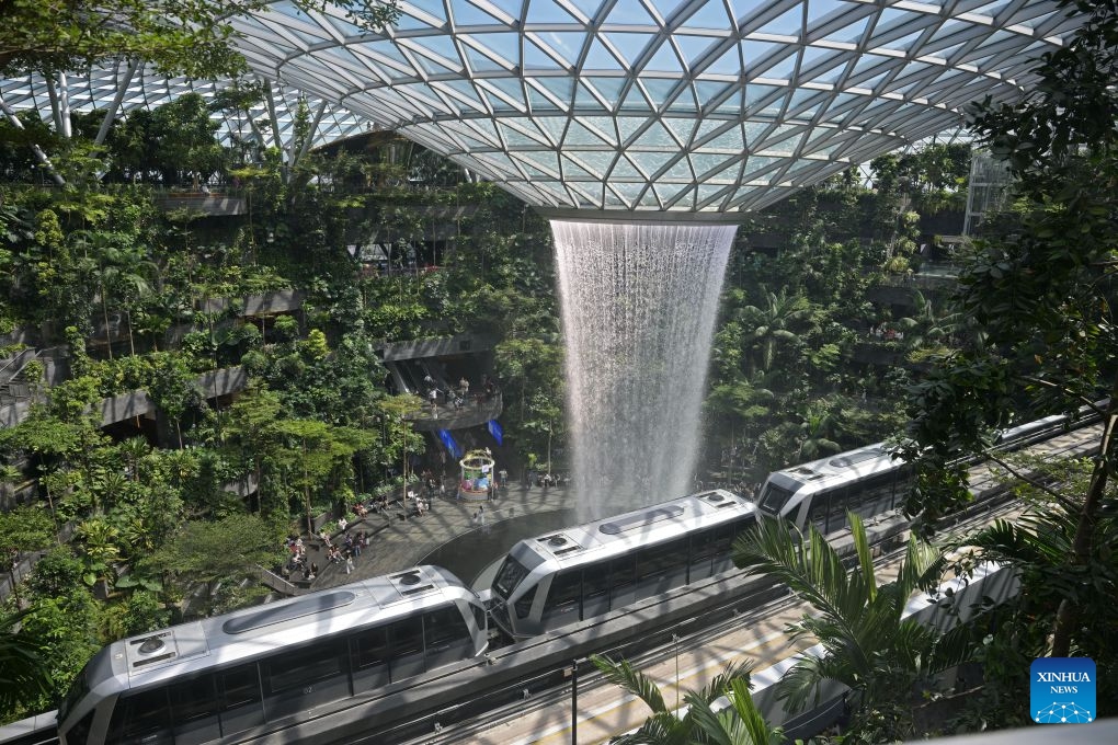 This photo taken on June 23, 2026 shows a view of the indoor man-made waterfall Rain Vortex at Jewel Changi Airport in Singapore. (Photo: Xinhua)