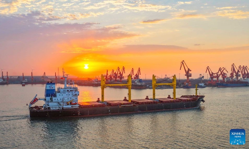 An aerial drone photo taken on June 23, 2026 shows a vessel departing from Jingtang area of Tangshan Port in Tangshan City, north China's Hebei Province. (Photo: Xinhua)