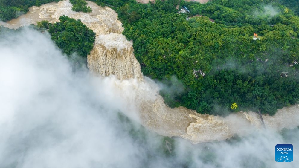 A drone photo taken on June 23, 2026 shows the Huangguoshu Waterfall in Anshun City, southwest China's Guizhou Province. Due to continuous rainfall and upstream inflow, Huangguoshu Waterfall in Anshun witnessed a surge in flow in recent days. (Photo: Xinhua)