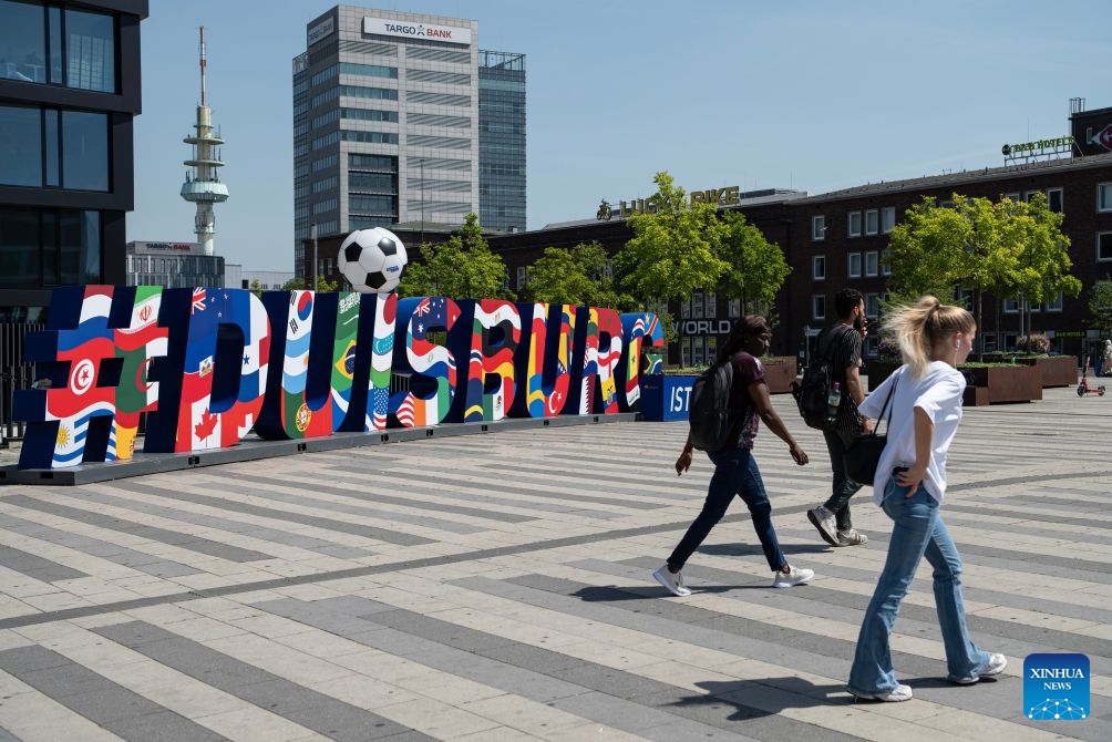 People walk in the sunshine in Duisburg, Germany, June 24, 2026. Germany has been experiencing a heatwave in recent days, with temperatures approaching 40 degrees Celsius in some regions. (Photo: Xinhua)