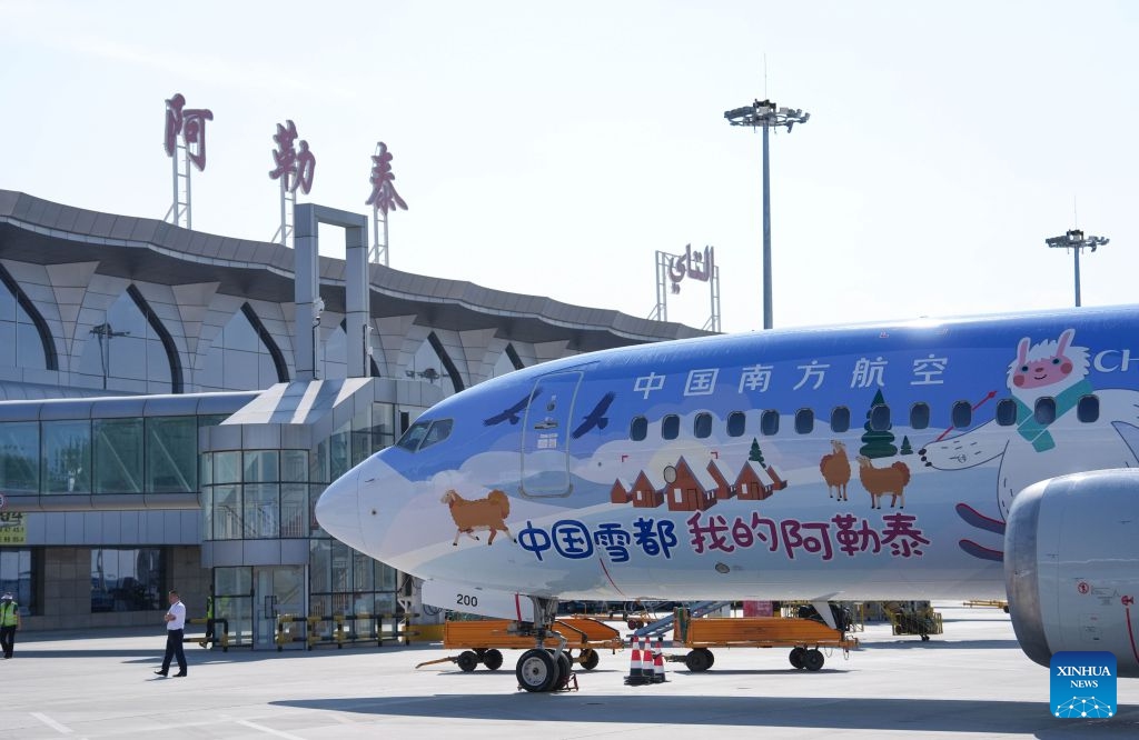 This photo taken on June 24, 2026 shows a painted plane at an airport in Altay, northwest China's Xinjiang Uygur Autonomous Region. China Southern Airlines held a launching ceremony for a painted plane on Wednesday, following which the plane will operate the flight from Altay to Beijing Daxing International Airport. (Photo: Xinhua)