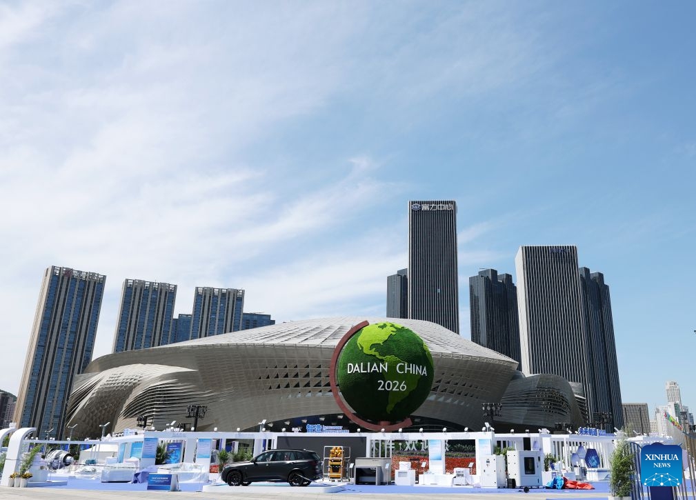 This photo taken on June 22, 2026 shows an exterior view of the Dalian International Conference Center, venue of the 2026 Summer Davos, in Dalian, northeast China's Liaoning Province. The World Economic Forum's Annual Meeting of the New Champions, also known as the Summer Davos forum, will be held in the port city of Dalian from June 23 to 25. (Photo: Xinhua)