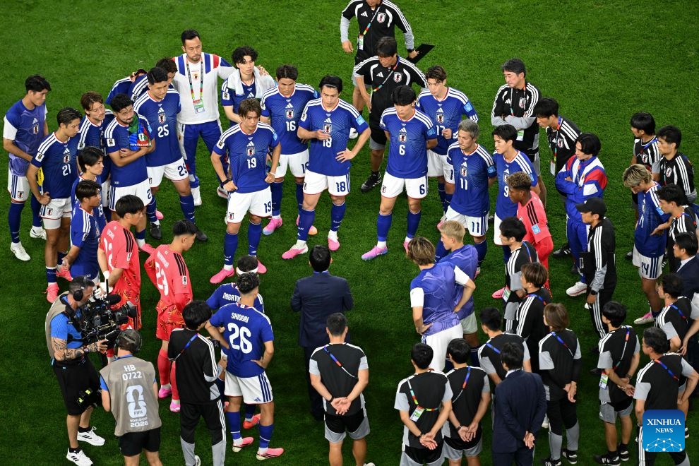 Moriyasu Hajime (C), head coach of Japan, instructs players after the group F match between Japan and Sweden at the 2026 FIFA World Cup at Dallas Stadium in Dallas, the United States, on June 25, 2026. (Xinhua/Cheng Min)
