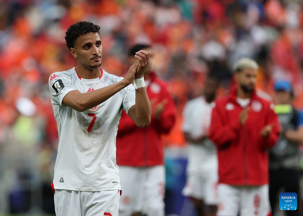 Elias Achouri of Tunisia greets the audience after the group F match between the Netherlands and Tunisia at the 2026 FIFA World Cup at Kansas City Stadium in Kansas City, the United States, June 25, 2026. (Xinhua/Li Ying)