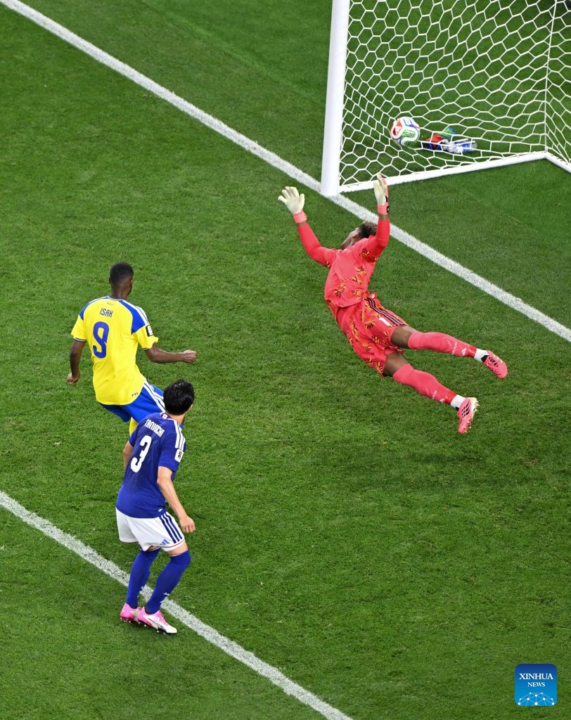 Goalkeeper Suzuki Zion (R) of Japan fails to save the ball during the group F match between Japan and Sweden at the 2026 FIFA World Cup at Dallas Stadium in Dallas, the United States, on June 25, 2026. (Xinhua/Cheng Min)