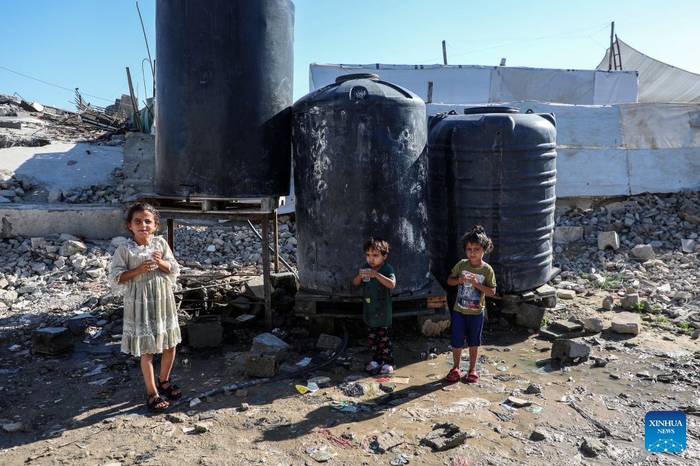 Displaced Palestinian children are pictured in Jabalia refugee camp, northern Gaza Strip, on June 23, 2026. (Photo by Rizek Abdeljawad/Xinhua)