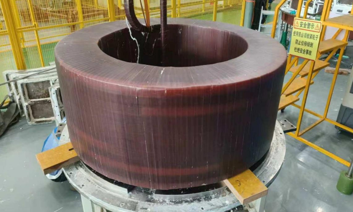 Photo of the the high-temperature superconducting central solenoid coil, one of the two key superconducting magnets for the fusion reactors in the Experimental Advanced Superconducting Tokamak Photo: Screenshot from CCTV News