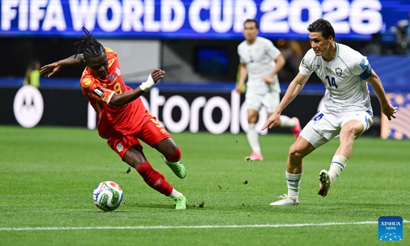 Brian Cipenga (L) of the Democratic Republic of the Congo (DRC) competes during the group K match between the Democratic Republic of the Congo and Uzbekistan at the 2026 FIFA World Cup at Atlanta Stadium in Atlanta, the United States, June 27, 2026. (Xinhua/Ju Huanzong)

