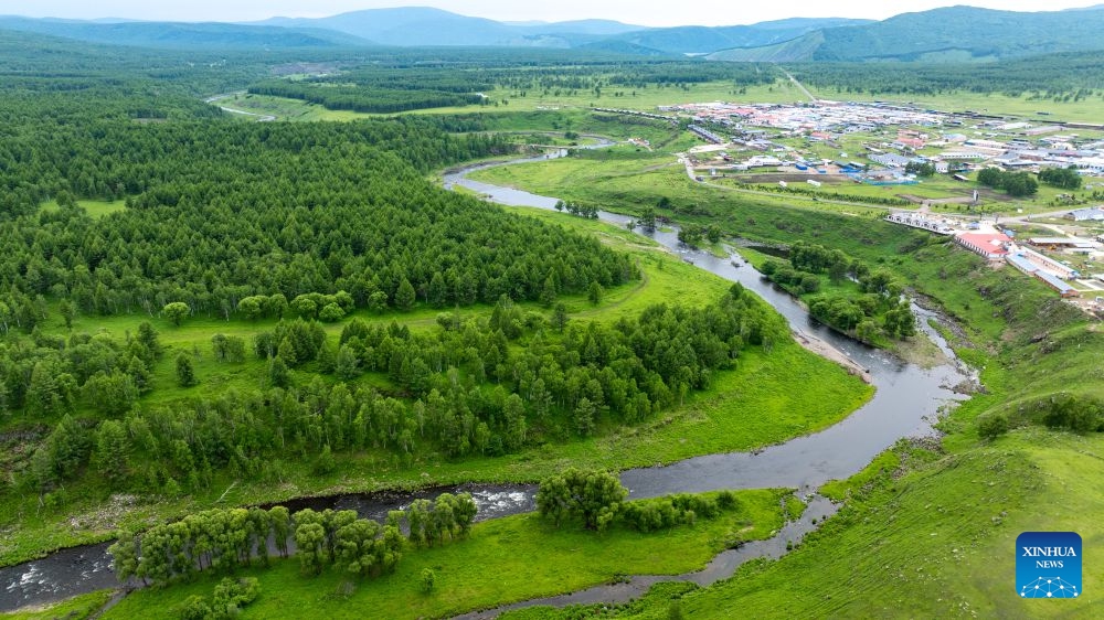 An aerial drone photo taken on June 27, 2026 shows the summer scenery of the Arxan National Forest Park, Hinggan League, north China's Inner Mongolia Autonomous Region. (Xinhua/Bei He)

